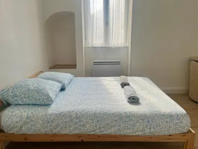 Un ou plusieurs lits dans un hébergement de l'établissement La maison de Joséphine, à 200m de la plage
