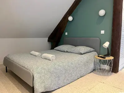 Un ou plusieurs lits dans un hébergement de l'établissement La maison de Joséphine, à 200m de la plage