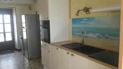 Cuisine ou kitchenette dans l'établissement Maison entre Cherbourg et Mont Saint Michel