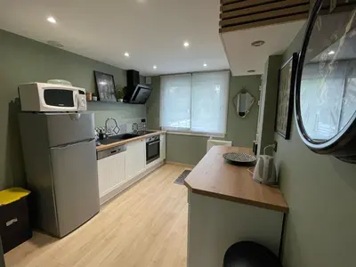 Cuisine ou kitchenette dans l'établissement Au Bord de L'Ô
