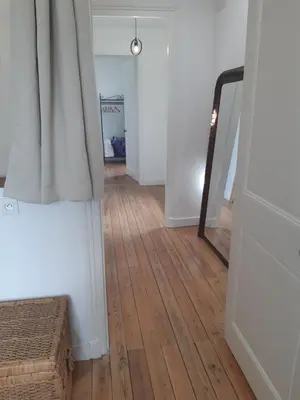 Un ou plusieurs lits dans un hébergement de l'établissement Maison de charme face au Canal