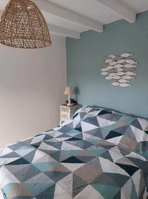 Un ou plusieurs lits dans un hébergement de l'établissement Maison dans la Manche