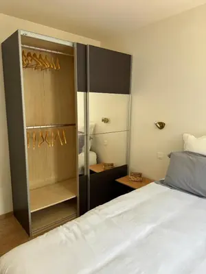 Un ou plusieurs lits dans un hébergement de l'établissement Appartement Granville hyper centre