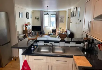 Cuisine ou kitchenette dans l'établissement Appartement Granville hyper centre