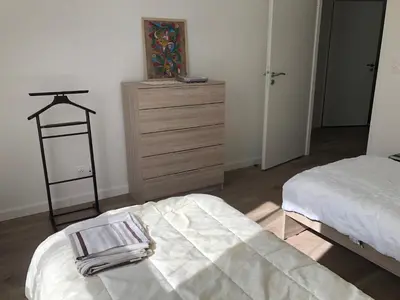 Un ou plusieurs lits dans un hébergement de l'établissement Appartement Verson