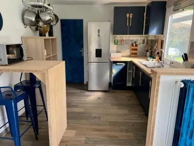 Cuisine ou kitchenette dans l'établissement Les Carrels d'Omaha