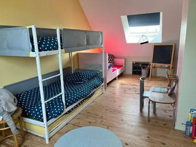 Un ou plusieurs lits dans un hébergement de l'établissement Colora Cottage - A 100 m de la plage