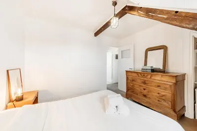 Un ou plusieurs lits dans un hébergement de l'établissement La Bisquine - Maison 3 chambres - Jardin clos