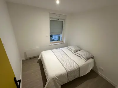 Un ou plusieurs lits dans un hébergement de l'établissement Appartement Djo&Juh 4