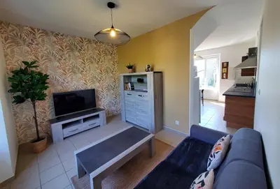 Télévision ou salle de divertissement dans l'établissement L'Évasion Maison typique de mineur