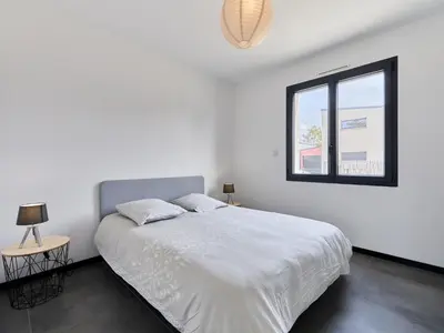 Un ou plusieurs lits dans un hébergement de l'établissement Holiday Home Manonga by Interhome