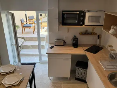 Cuisine ou kitchenette dans l'établissement Désirs d'une nuit - La détente