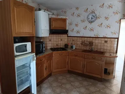 Cuisine ou kitchenette dans l'établissement La Maison de Falaise