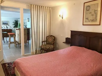 Un ou plusieurs lits dans un hébergement de l'établissement Appartement Coutain face Mer