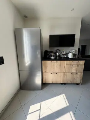 Cuisine ou kitchenette dans l'établissement Maison