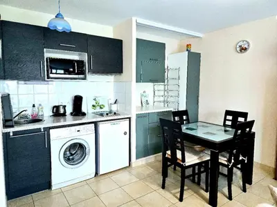 Cuisine ou kitchenette dans l'établissement Bel Appartement à RIVA BELLA - Parking Privé