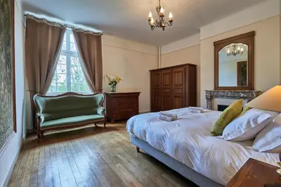 Un ou plusieurs lits dans un hébergement de l'établissement Manoir de l’Ormel