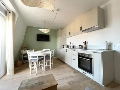 Cuisine ou kitchenette dans l'établissement T2 Vue mer, Au Balcon des Marées