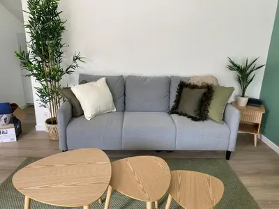 Coin salon dans l'établissement Maison cosy à Aure sur Mer