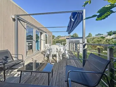Balcon ou terrasse dans l'établissement Mobil-home spacieux 6 pers, 3 ch, 2 sdb, proche plage - FR-1-361A-98