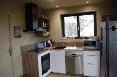 Cuisine ou kitchenette dans l'établissement Le petit Préau 10 min plages