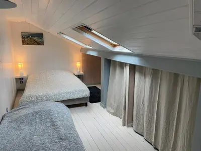 Un ou plusieurs lits dans un hébergement de l'établissement D-Day Cottage La Maove