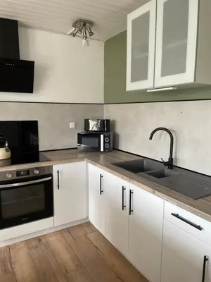 Cuisine ou kitchenette dans l'établissement Le Gîte Du Malt