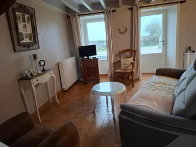 Télévision ou salle de divertissement dans l'établissement Les Campanules