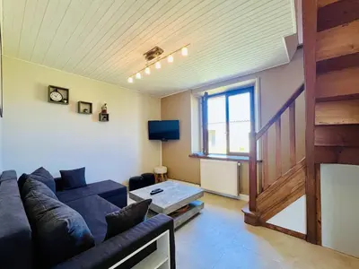 Télévision ou salle de divertissement dans l'établissement La Maison d Utah Beach and Memory