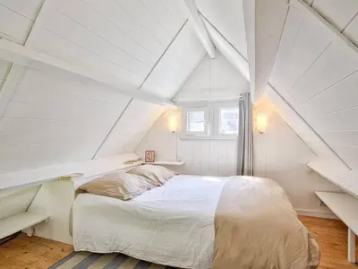 Un ou plusieurs lits dans un hébergement de l'établissement Chalet authentique à deux pas de la plage, parfait pour se détendre - FR-1-788-69