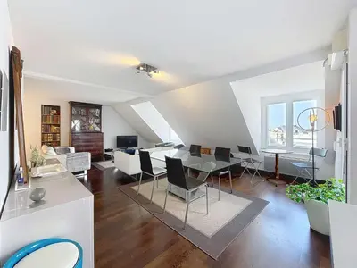 Télévision ou salle de divertissement dans l'établissement Duplex T3 avec terrasse au cœur de Granville - FR-1-361-566
