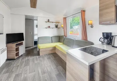 Télévision ou salle de divertissement dans l'établissement Pause à Litteau