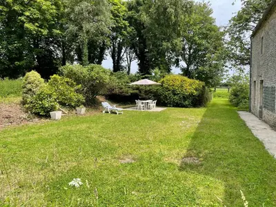 Jardin de l'établissement Maison spacieuse entre Bois Mer et Marais