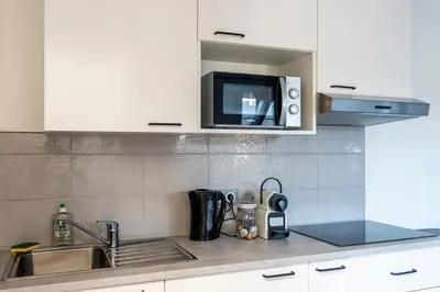 Cuisine ou kitchenette dans l'établissement Studio central et cosy à Caen