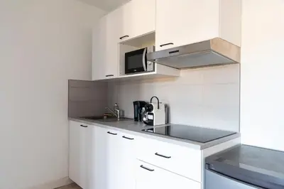 Cuisine ou kitchenette dans l'établissement Studio central et cosy à Caen