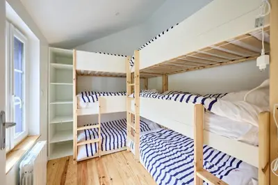 Un ou plusieurs lits dans un hébergement de l'établissement La Maison Valnotte - Proche du port de Carteret
