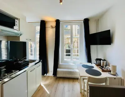 Cuisine ou kitchenette dans l'établissement Le Petit Guillaume