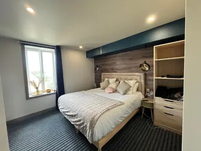 Un ou plusieurs lits dans un hébergement de l'établissement Villa huit chambres