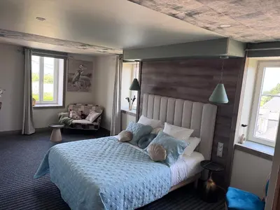 Un ou plusieurs lits dans un hébergement de l'établissement Villa huit chambres