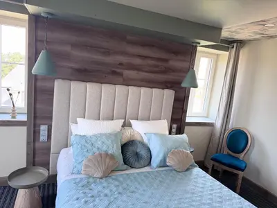 Un ou plusieurs lits dans un hébergement de l'établissement Villa huit chambres