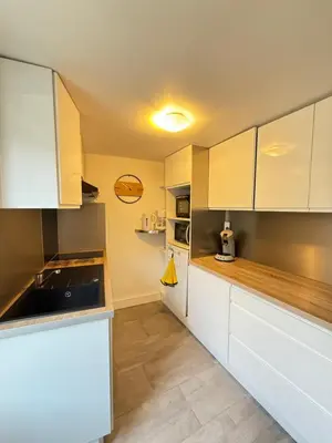 Cuisine ou kitchenette dans l'établissement Le Spot H34, Proche de la mer