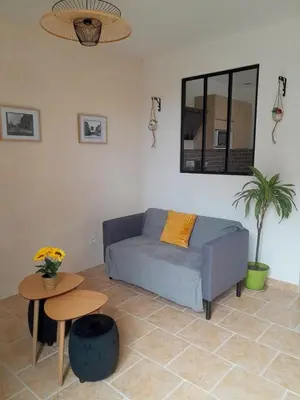 Coin salon dans l'établissement Gîte du Roc 1