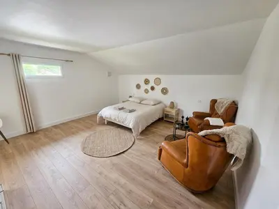 Un ou plusieurs lits dans un hébergement de l'établissement La Parenthèse Normande, Location maison avec jardin
