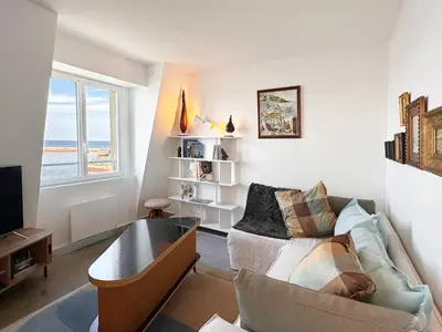 Coin salon dans l'établissement Fenêtre sur Mer I CAP MER