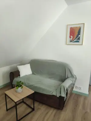 Coin salon dans l'établissement Gîte au fil de l eau
