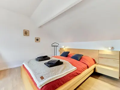 Un ou plusieurs lits dans un hébergement de l'établissement Holiday Home Bellevue by Interhome