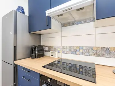 Cuisine ou kitchenette dans l'établissement Holiday Home la Rivière by Interhome