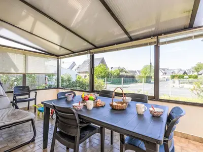 Coin salon dans l'établissement Holiday Home Le Petit Moulin by Interhome
