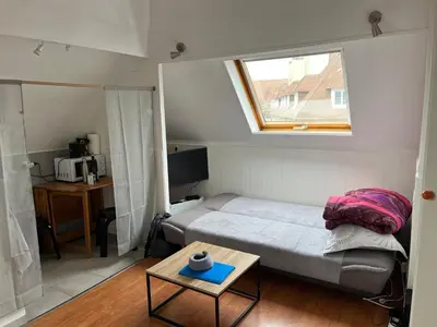 Un ou plusieurs lits dans un hébergement de l'établissement Studio - Port Ferry Ouitreham