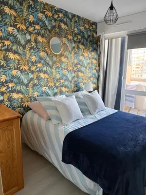 Un ou plusieurs lits dans un hébergement de l'établissement LOOVAEL appartement vue sur port de plaisance ET mer